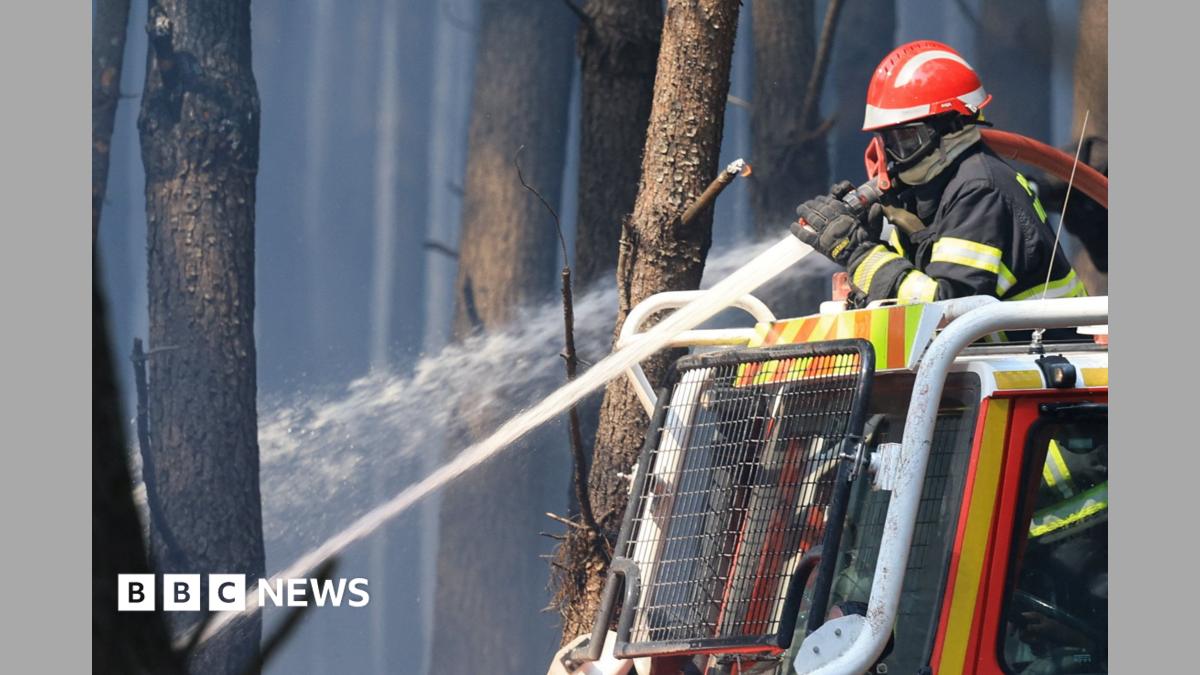 France wildfire crews face searing heat in battle to contain flames