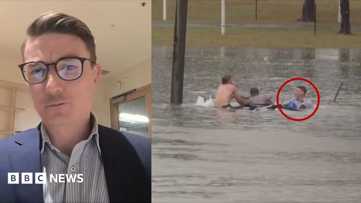 Moment man rescued from sinking car by Australian TV reporter
